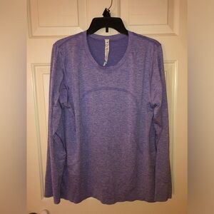 Lululemon size 12 EUC Long sleeve top very good gently used condition